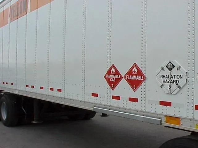 Trailer with flammable gas and inhalation hazard placards